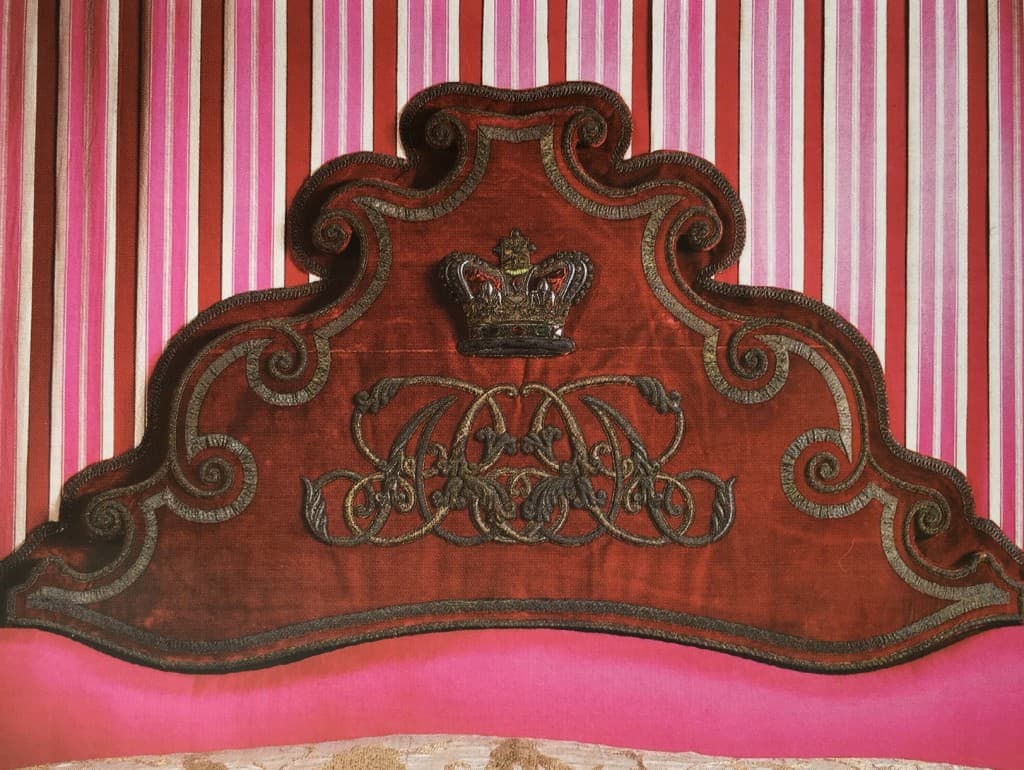 Queen Adelaide's Monogram on the headboard