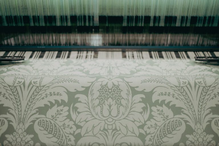 Loom waving green fabric