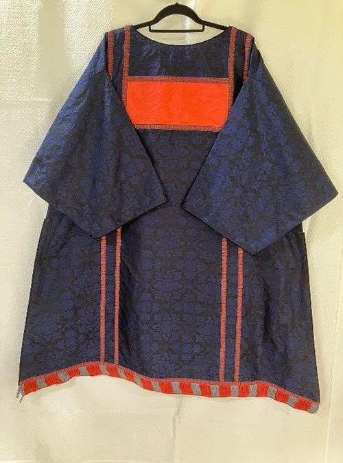 The back of St Marks Sarum Advent, blue damask vestments with red highlight