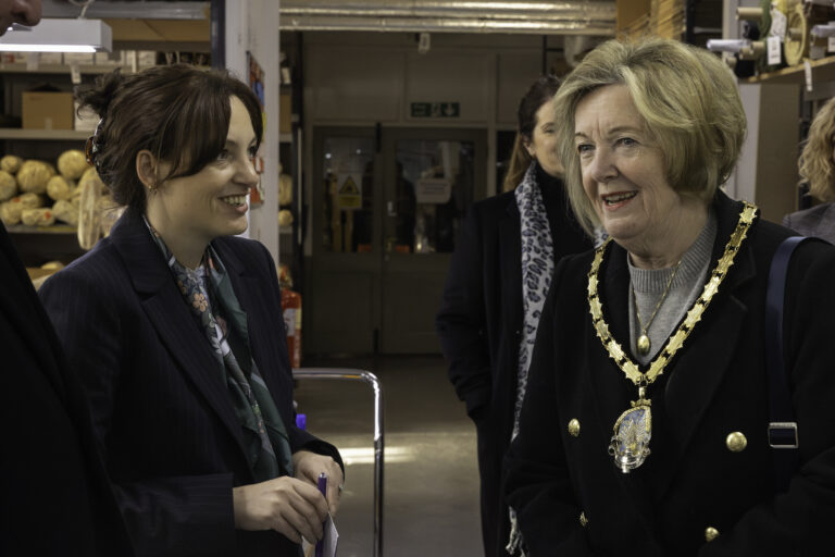 Natalie Mumford speaking with Deputy Lieutenant during tour of inspection room