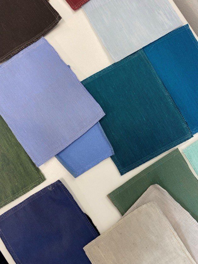 plain silk and linen fabric colour swatches in blues and greens