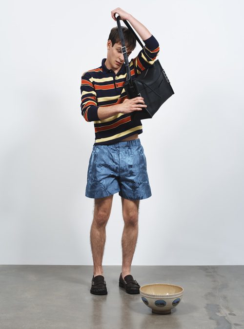 Blue Silk Damask Shorts with male model with handbag and ceramic pot