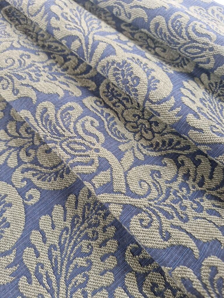 Intern twinned leaf design with blue background fabric