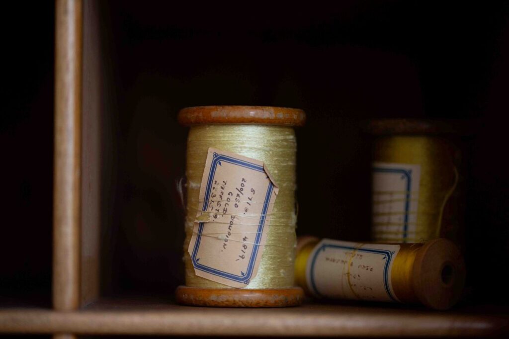 Spools of yellow yarn